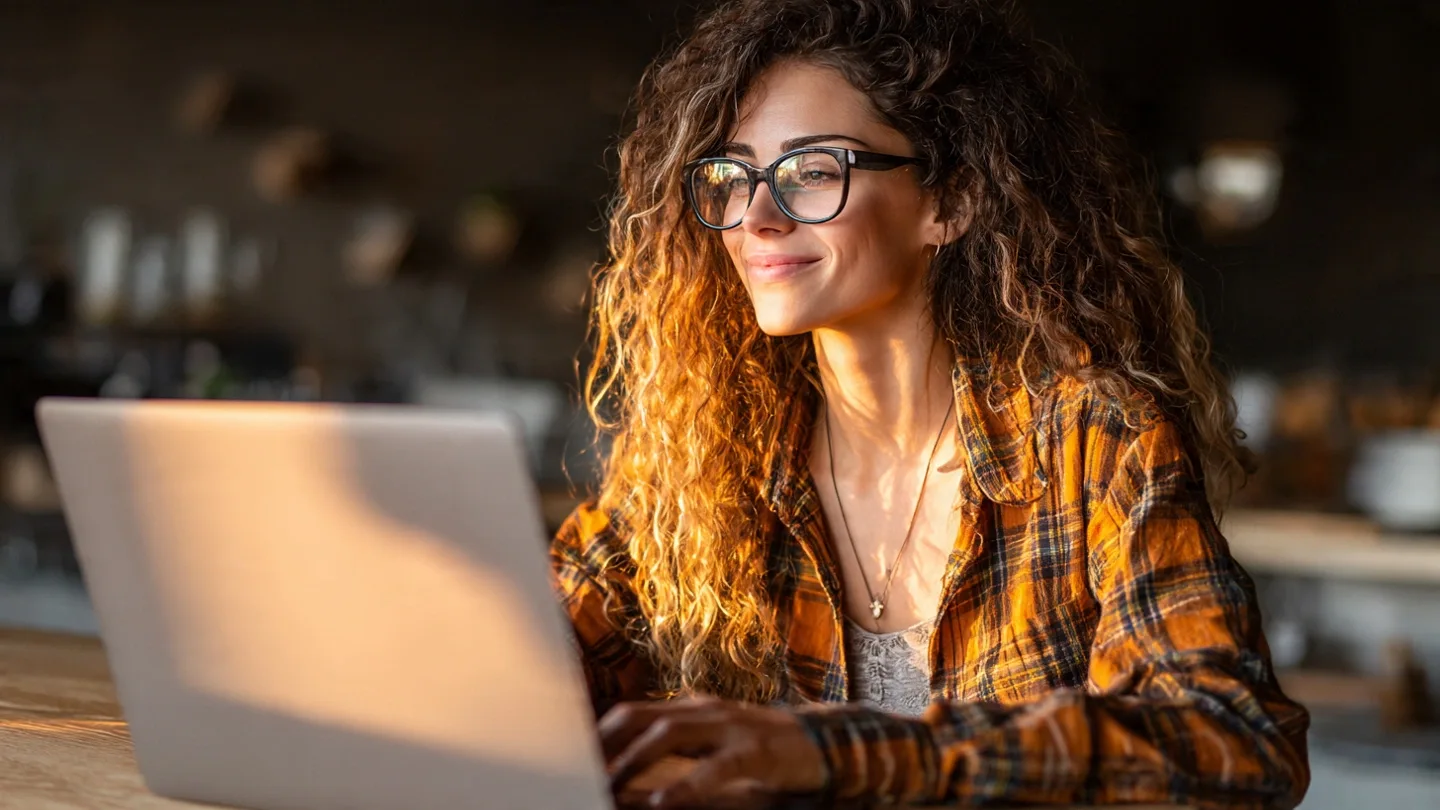 a_young_professional_working_on_a_laptop_11zon